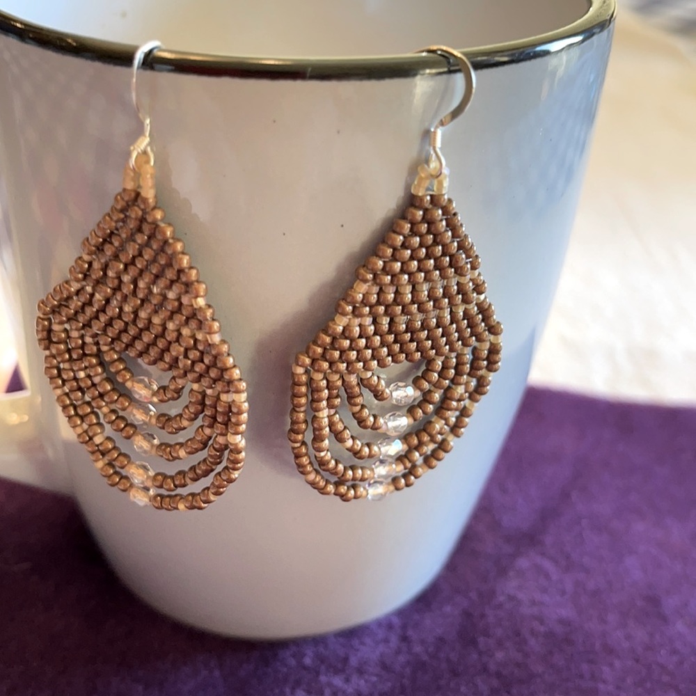 Hand made beaded tear drop earrings.